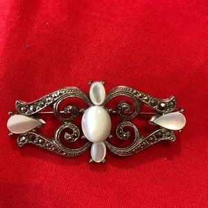 Ornate filigree brooch